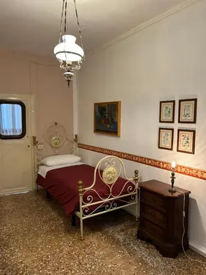 Letto o letti in una camera di Lions Venice Guest house