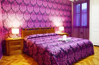 Letto o letti in una camera di Venice Rainbow Apartment San Marco 540