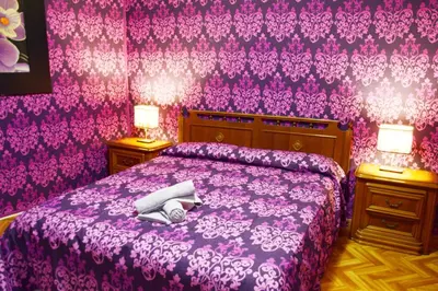Letto o letti in una camera di Venice Rainbow Apartment San Marco 540