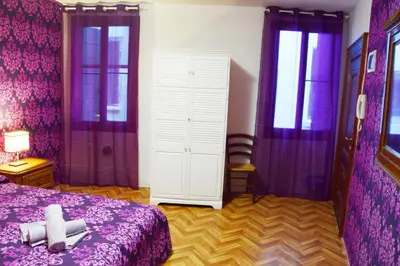 Letto o letti in una camera di Venice Rainbow Apartment San Marco 540