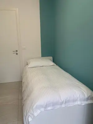 Letto o letti in una camera di Casa di EVA