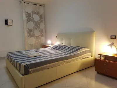 Letto o letti in una camera di VENEZIA Clodiense