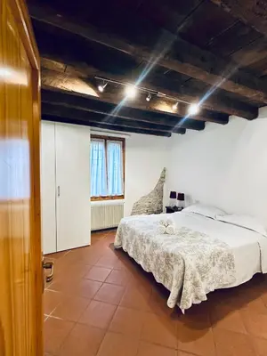 Letto o letti in una camera di San Pancrazio Home