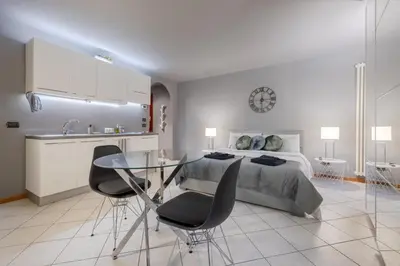 Letto o letti in una camera di Charme Studio - Parcheggio a 20 Mt - 5 min dalla Fiera di Vicenza