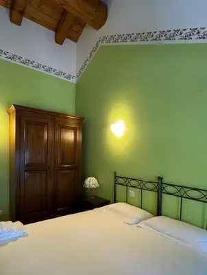 Letto o letti in una camera di Locanda al Convento