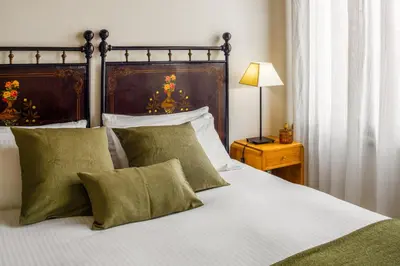 Letto o letti in una camera di Santa Giustina Palace R&R