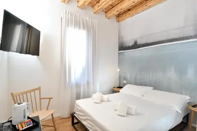 Letto o letti in una camera di Hotel Rio