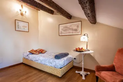 Letto o letti in una camera di Residenza Santo Stefano