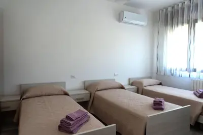 Letto o letti in una camera di BnB Martin