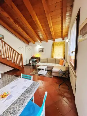 Area soggiorno di Holiday Treviso Suite Venezia