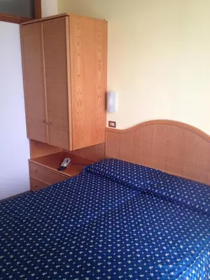 Letto o letti in una camera di Hotel Roma