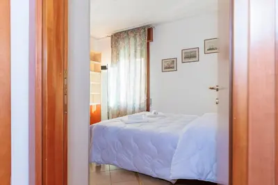 Letto o letti in una camera di Casa Carla - Comodo appartamento in Venice Cannaregio - 2 Camere private