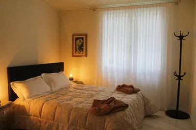 Letto o letti in una camera di Villa Jasmine