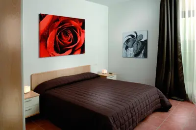 Letto o letti in una camera di Jesolo Living at Golf Club Jesolo