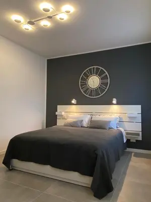 Letto o letti in una camera di Greenway Apartment