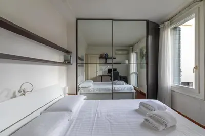 Letto o letti in una camera di Casa Moretta - Padova Santa Sofia