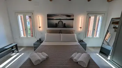 Letto o letti in una camera di Casa Rosabianca