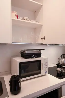 Cucina o angolo cottura di GINNY HOUSE VENEZIA - appartamento moderno open Space vicino Venezia e Padova