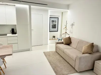 Area soggiorno di GINNY HOUSE VENEZIA - appartamento moderno open Space vicino Venezia e Padova
