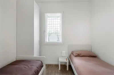 Letto o letti in una camera di Civico 36 a due passi dal Centro - Casa Guido