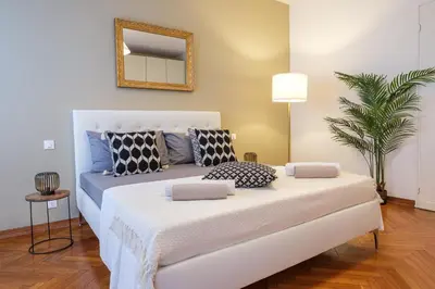 Letto o letti in una camera di Padova Lux Station