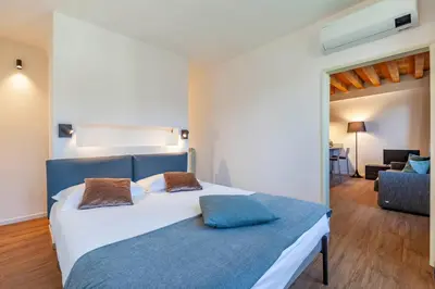 Letto o letti in una camera di SAN LORENZO APARTMENTS 5054