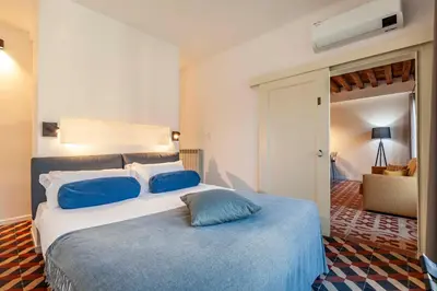 Letto o letti in una camera di SAN LORENZO APARTMENTS 5054