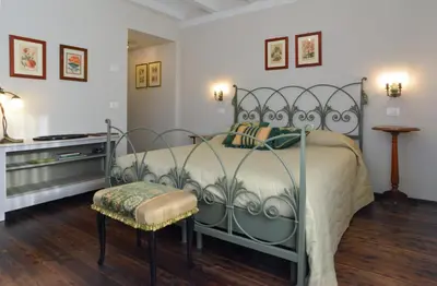 Letto o letti in una camera di i Torretti Locazione Turistica, Ristorante, Lounge Bar
