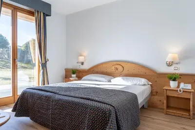Letto o letti in una camera di Hotel Canova Sport & Relax