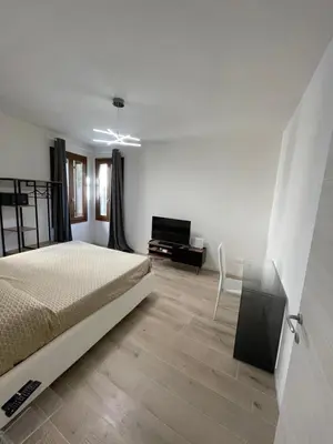 Letto o letti in una camera di Appartamento Domus