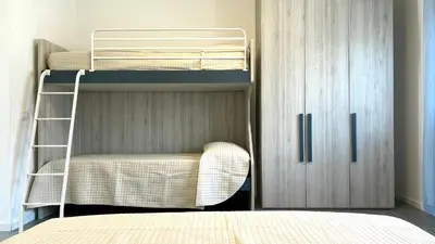 Letto o letti in una camera di Appartamenti Vanin Ca' di Valle