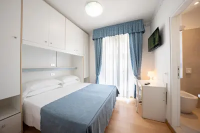 Letto o letti in una camera di Hotel Laurin