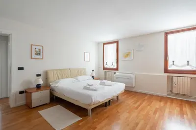 Letto o letti in una camera di Ca' Coriandolo