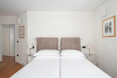 Letto o letti in una camera di Ca' Coriandolo