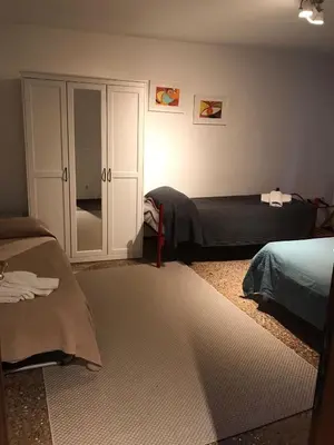 Letto o letti in una camera di Cà Square San Marco 425
