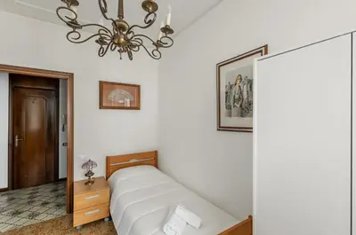 Letto o letti in una camera di GuestHost - Matilde House near the Station!
