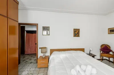 Letto o letti in una camera di GuestHost - Matilde House near the Station!