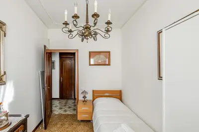 Letto o letti in una camera di GuestHost - Matilde House near the Station!