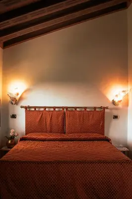 Letto o letti in una camera di Hotel Liberty