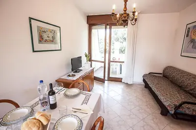 TV o dispositivi per l'intrattenimento presso Seaside serenity flat with outdoor pool