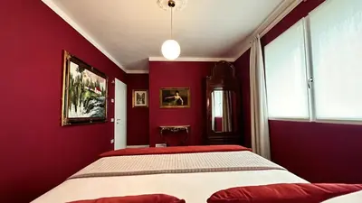 Letto o letti in una camera di Villa Danilla