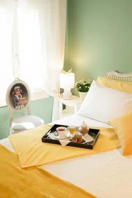 Letto o letti in una camera di Casa Paola