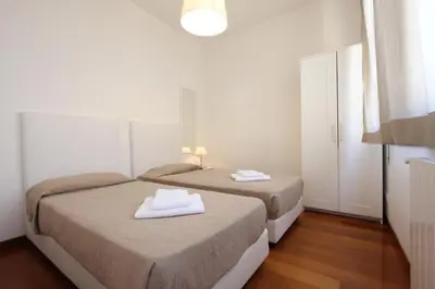 Letto o letti in una camera di Grand Canal Terrace Palace