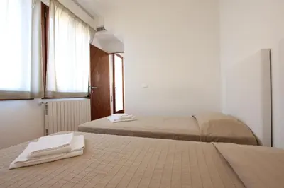 Letto o letti in una camera di Grand Canal Terrace Palace