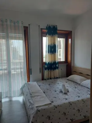Letto o letti in una camera di #Punto FM 1#