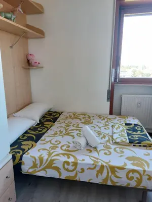 Letto o letti in una camera di #Punto FM 1#