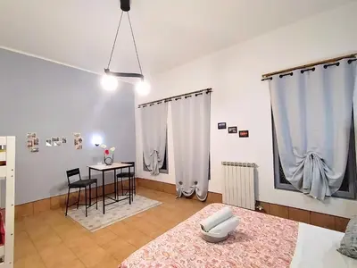 Letto o letti in una camera di Pavarotti