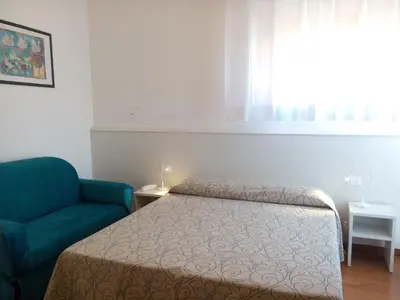 Letto o letti in una camera di Hotel Telenia