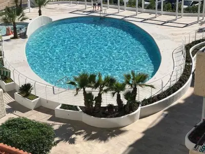 Piscina di Residence EL PALMAR o nelle vicinanze