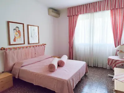 Letto o letti in una camera di CONDOMINIO GUSSO